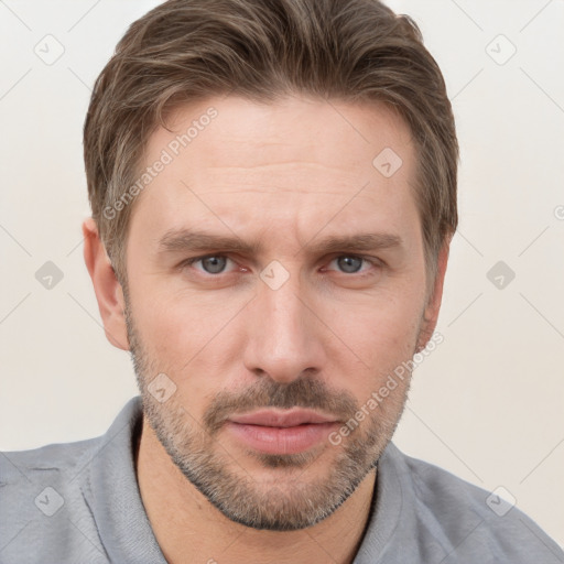 Neutral white young-adult male with short  brown hair and grey eyes