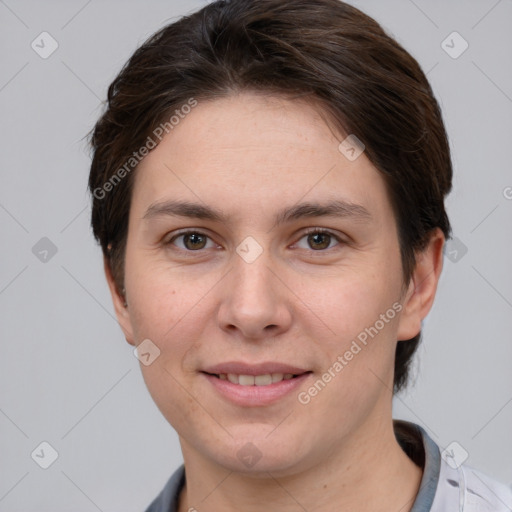 Joyful white young-adult female with short  brown hair and brown eyes