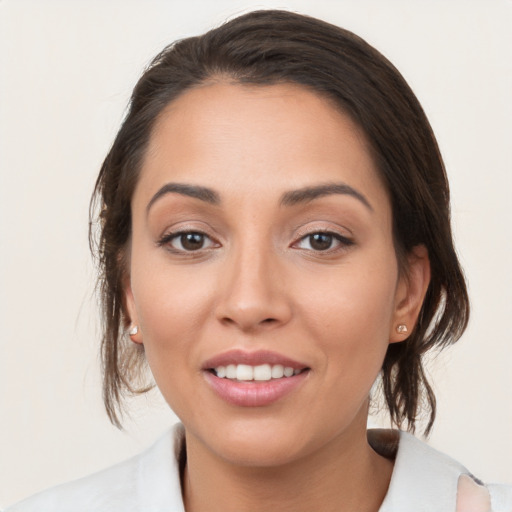 Joyful white young-adult female with medium  brown hair and brown eyes