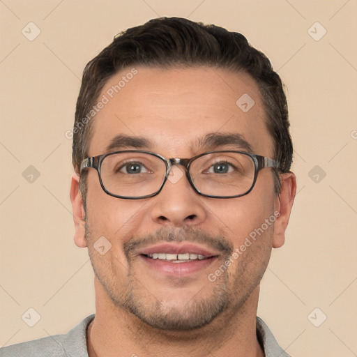 Joyful white adult male with short  brown hair and brown eyes