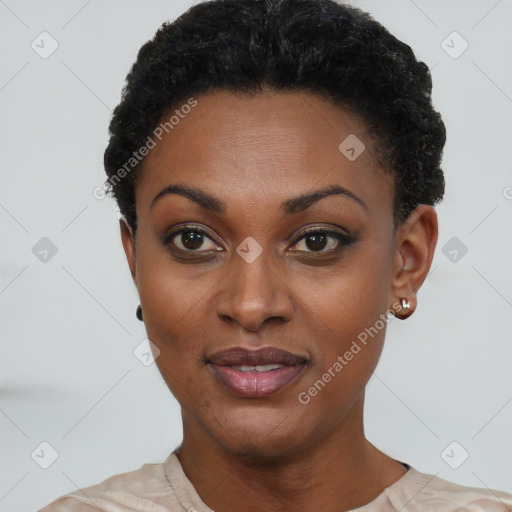 Joyful black young-adult female with short  black hair and brown eyes
