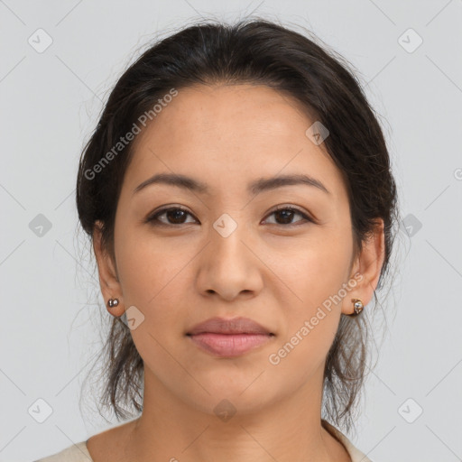 Joyful latino young-adult female with medium  brown hair and brown eyes