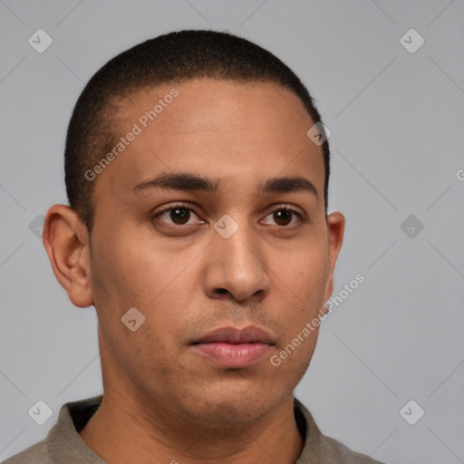 Neutral latino young-adult male with short  brown hair and brown eyes