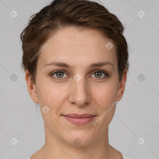 Joyful white young-adult female with short  brown hair and grey eyes