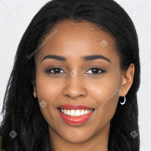 Joyful latino young-adult female with long  brown hair and brown eyes