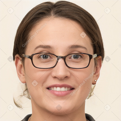 Joyful white young-adult female with medium  brown hair and grey eyes