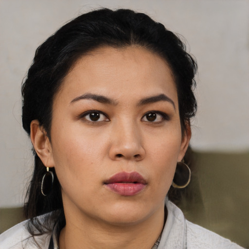 Neutral asian young-adult female with medium  black hair and brown eyes
