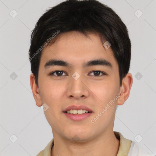 Joyful asian young-adult male with short  brown hair and brown eyes