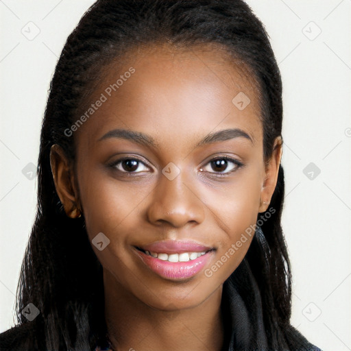 Joyful black young-adult female with long  brown hair and brown eyes