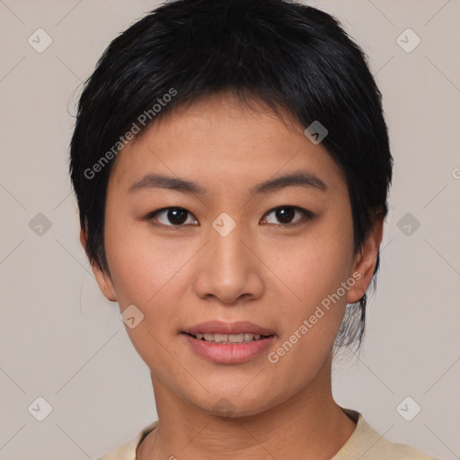 Joyful asian young-adult female with short  black hair and brown eyes