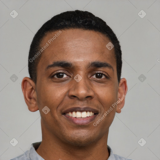 Joyful latino young-adult male with short  black hair and brown eyes