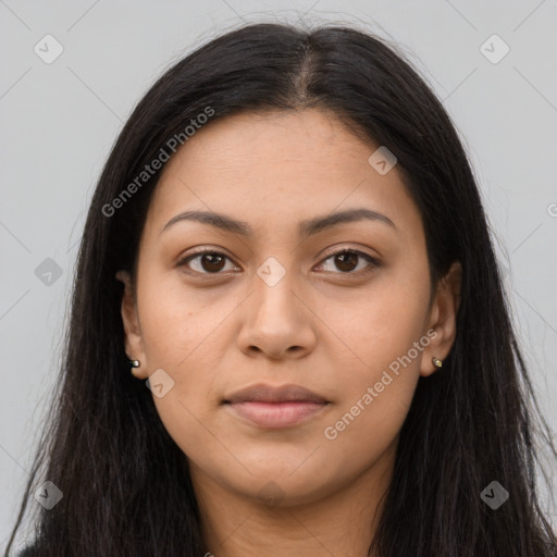 Joyful latino young-adult female with long  brown hair and brown eyes