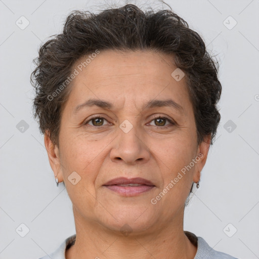 Joyful white adult female with short  brown hair and brown eyes