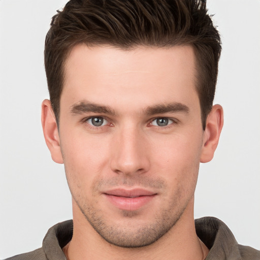 Neutral white young-adult male with short  brown hair and brown eyes