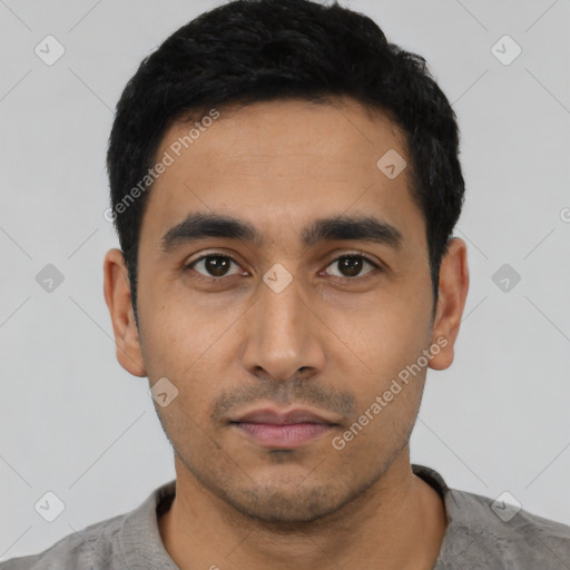 Neutral latino young-adult male with short  black hair and brown eyes