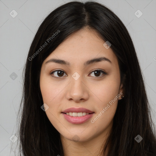 Joyful asian young-adult female with long  brown hair and brown eyes