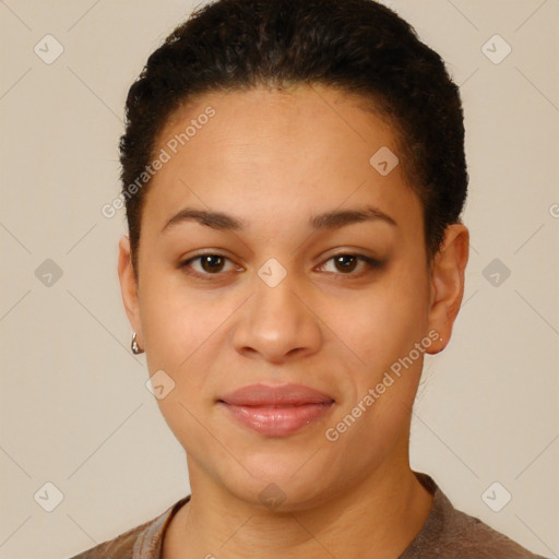 Joyful black young-adult female with short  brown hair and brown eyes