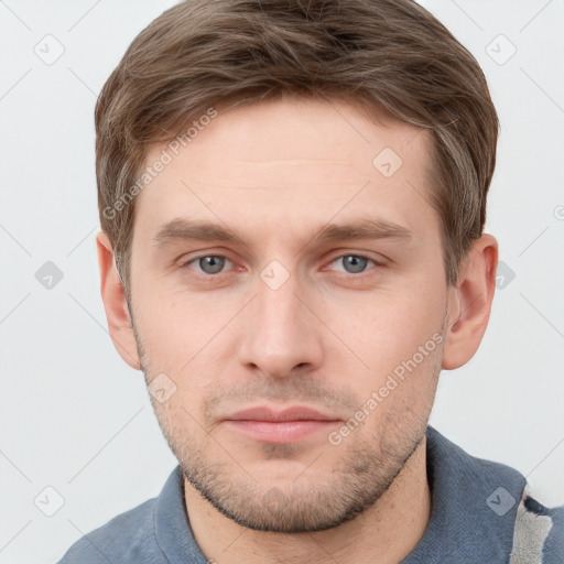 Neutral white young-adult male with short  brown hair and grey eyes