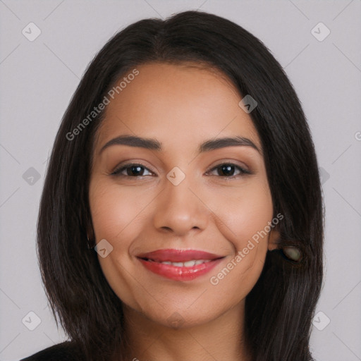 Joyful latino young-adult female with long  black hair and brown eyes