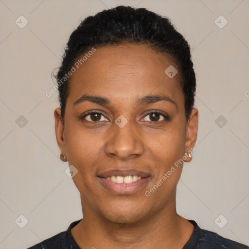 Joyful black young-adult female with short  black hair and brown eyes