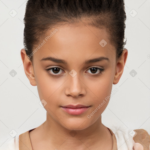 Joyful white child female with short  brown hair and brown eyes