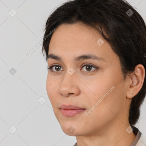 Neutral white young-adult female with long  brown hair and brown eyes