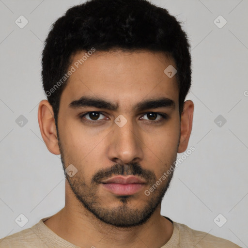 Neutral latino young-adult male with short  black hair and brown eyes