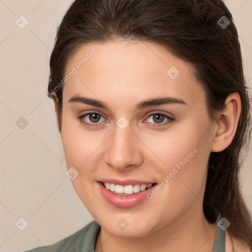 Joyful white young-adult female with medium  brown hair and brown eyes