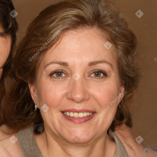 Joyful white adult female with medium  brown hair and green eyes