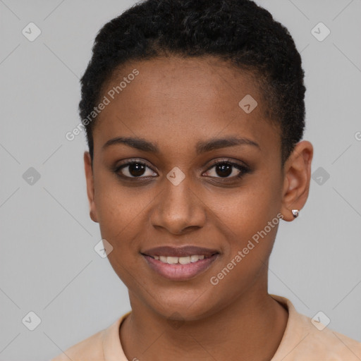 Joyful black young-adult female with short  black hair and brown eyes