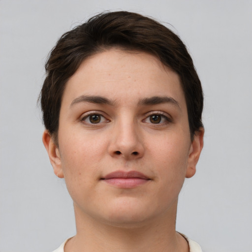 Neutral white young-adult female with short  brown hair and brown eyes