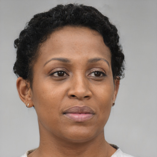 Neutral black adult female with short  brown hair and brown eyes