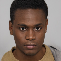 Neutral black young-adult male with short  brown hair and brown eyes