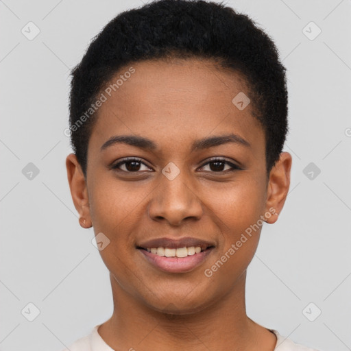 Joyful black young-adult female with short  black hair and brown eyes