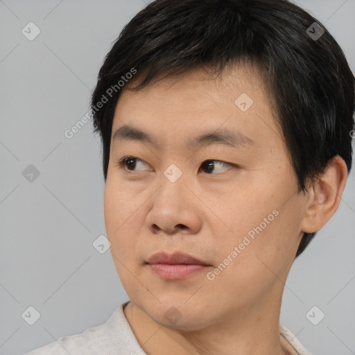 Neutral asian young-adult male with short  black hair and brown eyes