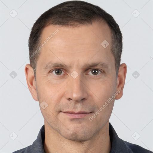 Neutral white adult male with short  brown hair and brown eyes