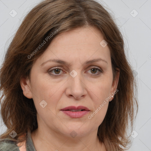 Joyful white adult female with medium  brown hair and grey eyes