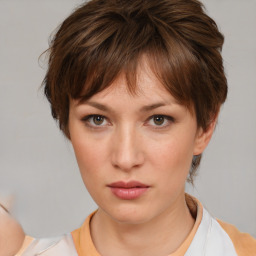 Neutral white young-adult female with medium  brown hair and brown eyes