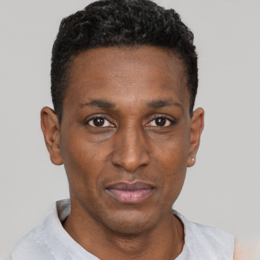 Neutral black adult male with short  black hair and brown eyes