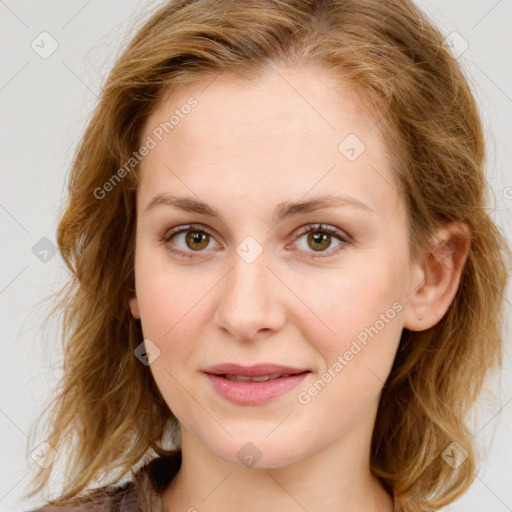 Joyful white young-adult female with medium  brown hair and green eyes