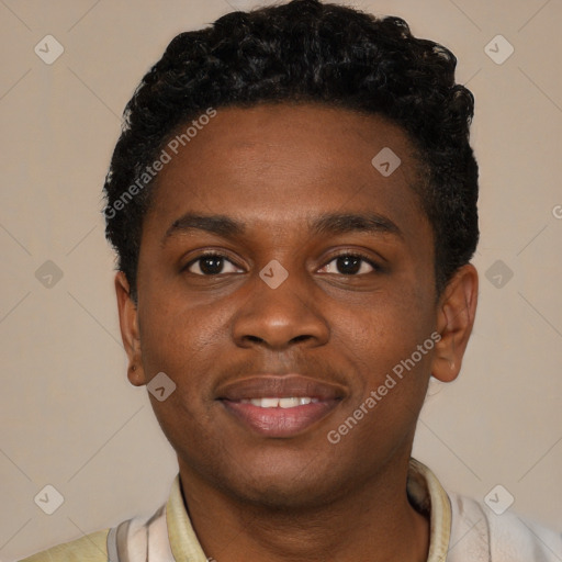 Joyful black young-adult male with short  brown hair and brown eyes