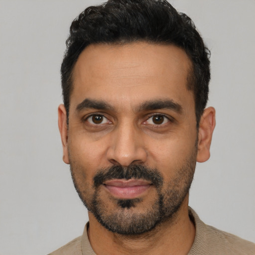 Neutral latino adult male with short  black hair and brown eyes