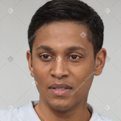 Joyful latino young-adult male with short  black hair and brown eyes