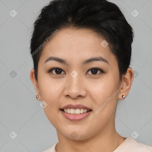 Joyful asian young-adult female with short  brown hair and brown eyes