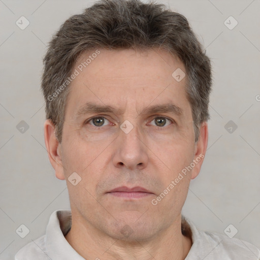 Neutral white adult male with short  brown hair and grey eyes