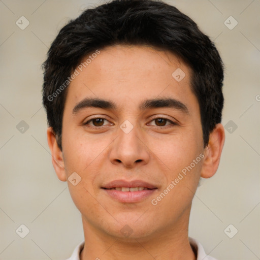 Joyful white young-adult male with short  black hair and brown eyes