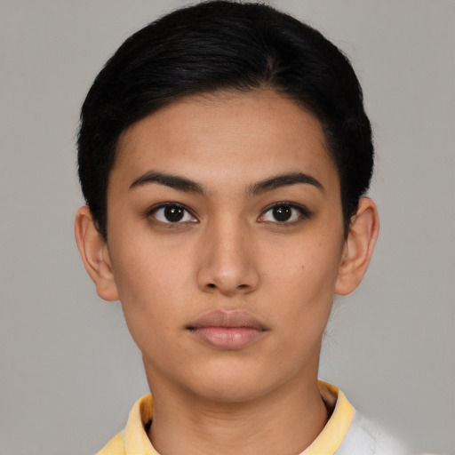 Neutral latino young-adult female with short  black hair and brown eyes
