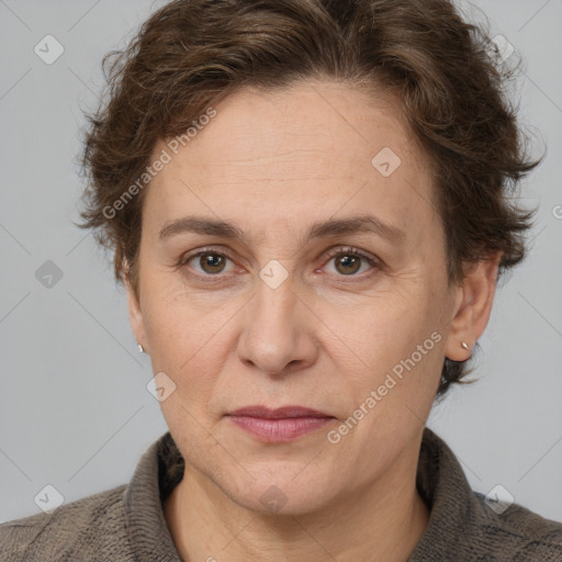 Joyful white adult female with short  brown hair and brown eyes