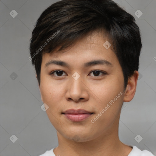 Joyful asian young-adult male with short  brown hair and brown eyes