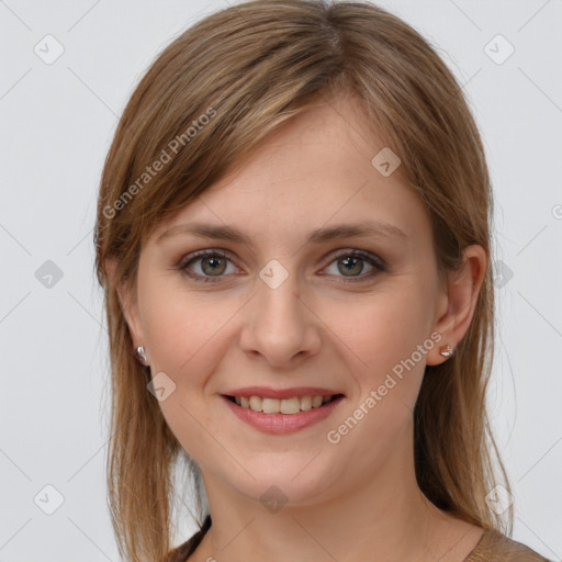 Joyful white young-adult female with medium  brown hair and grey eyes